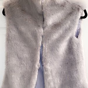 Gray fuzzy vest